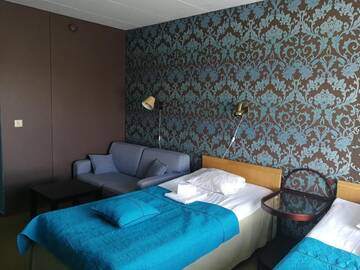 Фото номера Стандартный двухместный номер с 2 отдельными кроватями Отель Hotel Villa Vanessa г. Силтакюла 6